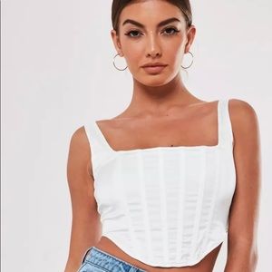 White satin corset top.